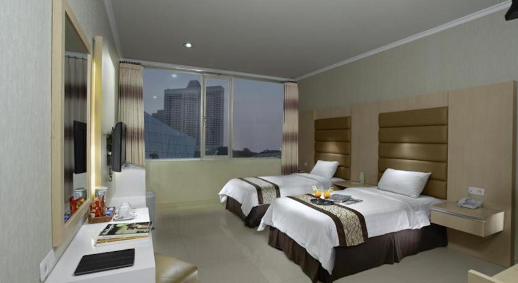 סוראבאיה Oyo 235 Maumu Hotel & Lounge מראה חיצוני תמונה